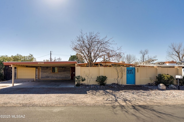 view of front of house featuring a carport