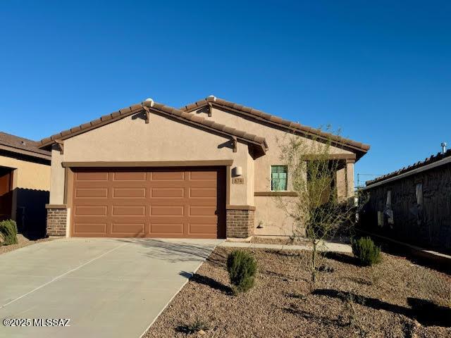 view of front of home featuring a garage