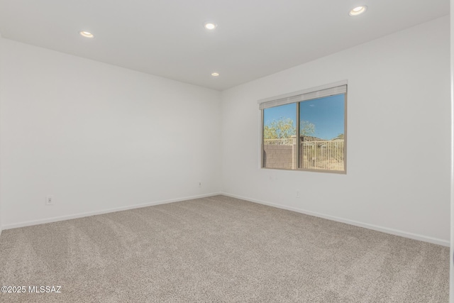 empty room with carpet flooring