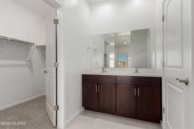 bathroom featuring vanity and tile patterned flooring