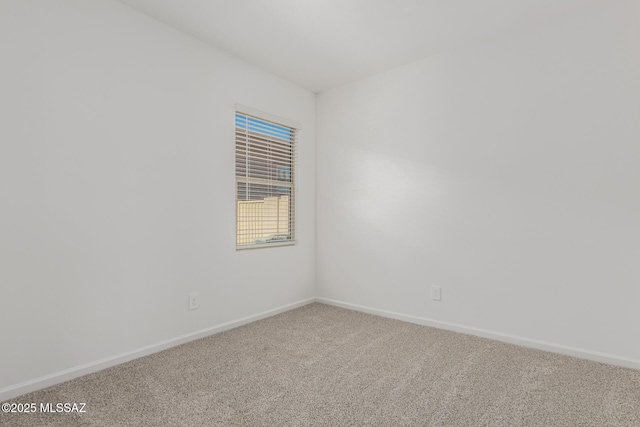 spare room with carpet flooring