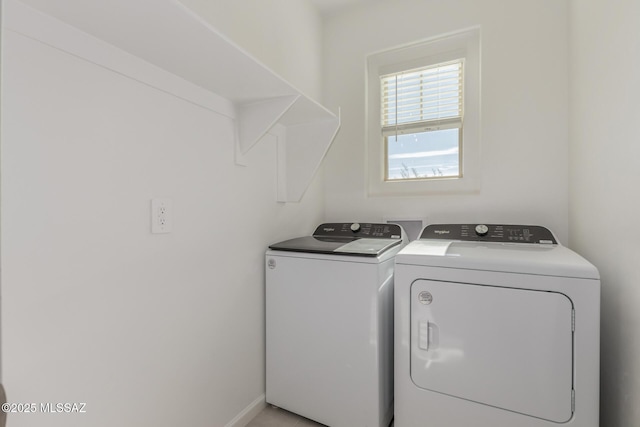 laundry room with washer and clothes dryer