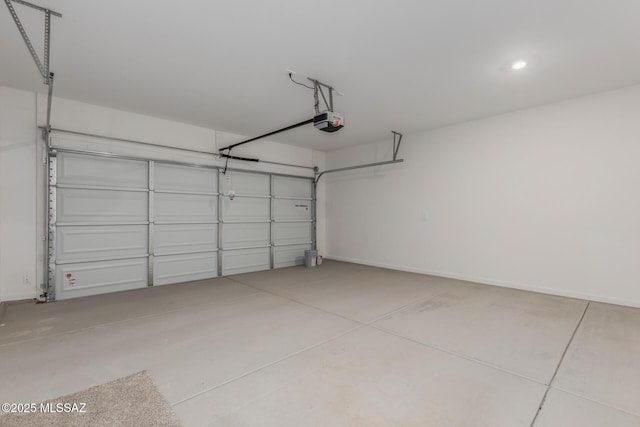 garage featuring a garage door opener