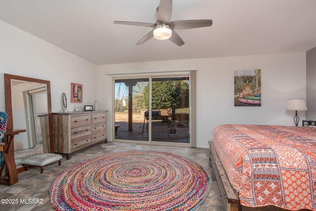 bedroom featuring ceiling fan and access to exterior