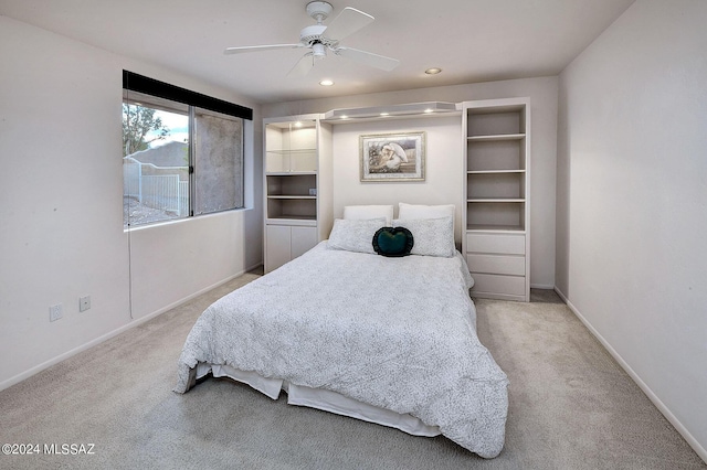 carpeted bedroom with ceiling fan