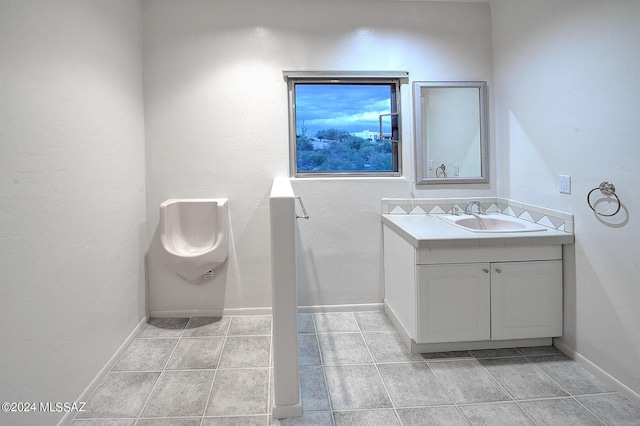 bathroom featuring vanity and tile patterned floors