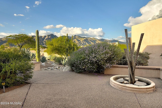 view of patio / terrace with a mountain view