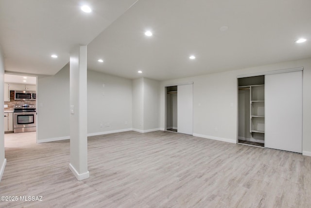 basement with light wood-type flooring