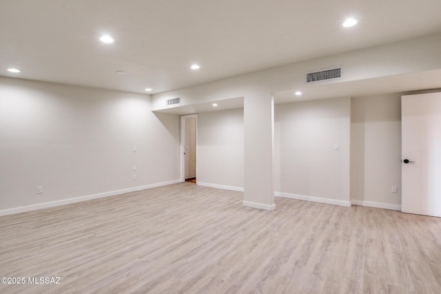 basement with light wood-type flooring