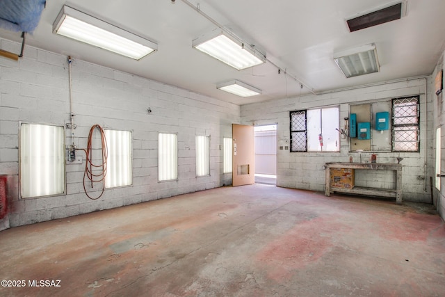 interior space featuring concrete flooring