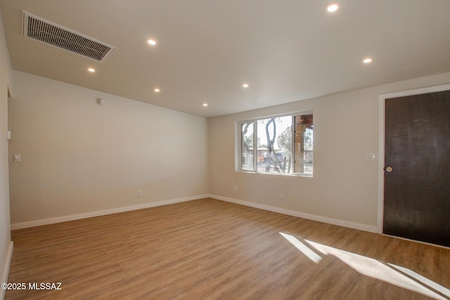 empty room featuring light hardwood / wood-style floors