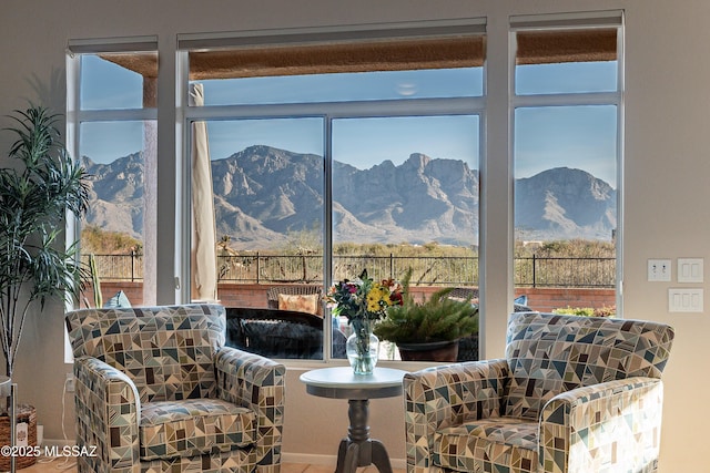 sitting room featuring a mountain view