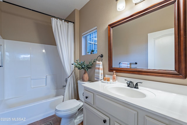 full bathroom featuring vanity, shower / tub combo with curtain, and toilet