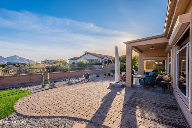 view of patio / terrace featuring a mountain view