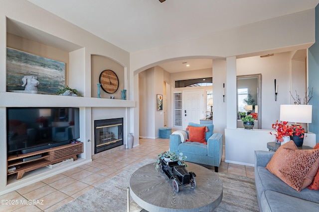 living room with light tile patterned floors