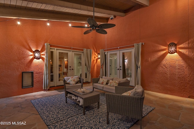 view of patio / terrace featuring an outdoor living space, french doors, and ceiling fan