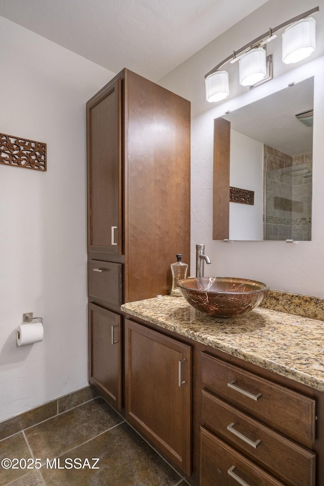 bathroom featuring vanity and tile patterned floors