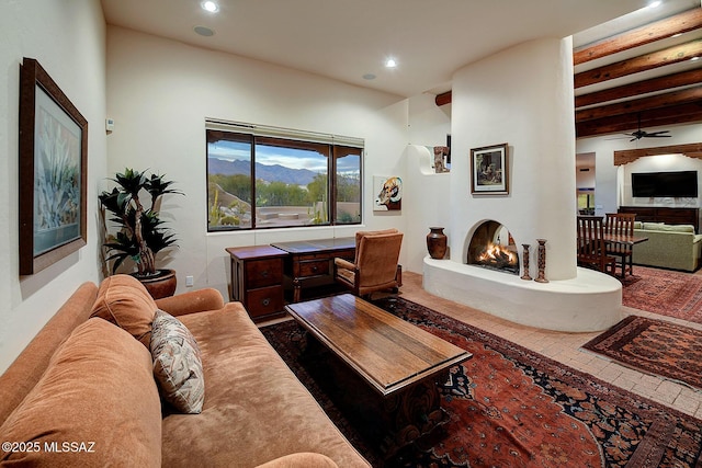 living room with beam ceiling