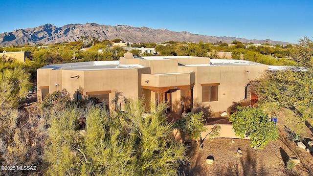 exterior space with a mountain view