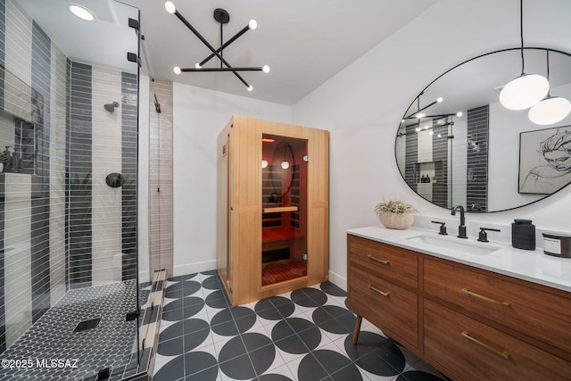 bathroom with vanity, tile patterned flooring, and walk in shower