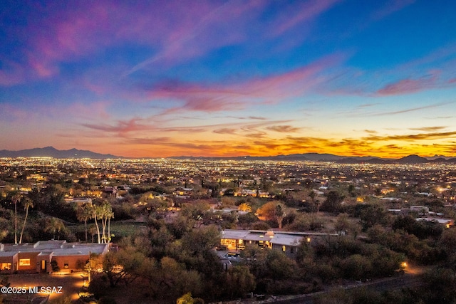 aerial view at dusk with a mountain view