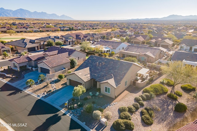 bird's eye view with a mountain view