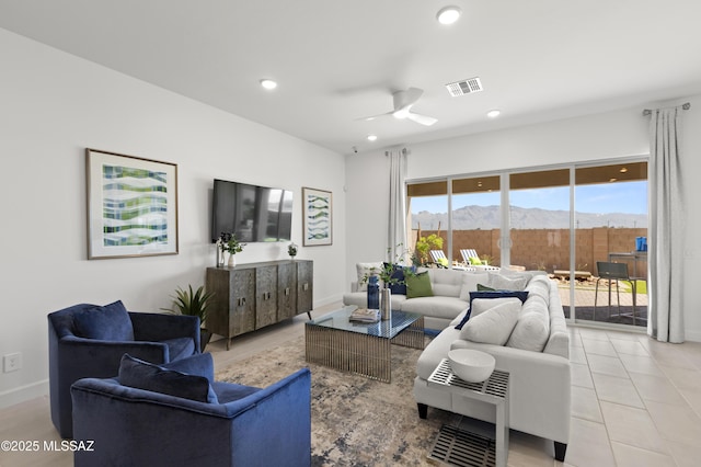 living room with ceiling fan