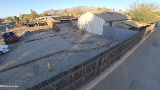 exterior space featuring a mountain view