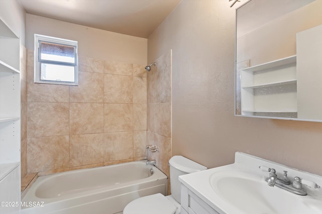 full bathroom featuring vanity, toilet, and tiled shower / bath combo