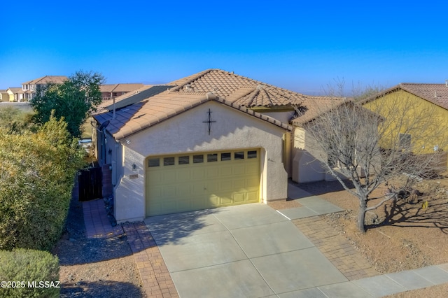 view of front of home with a garage