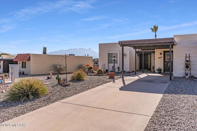 exterior space featuring a mountain view