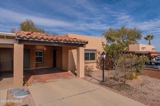 exterior space featuring a carport