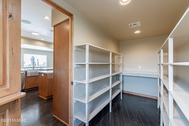 storage room with sink