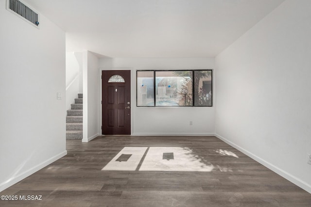 entrance foyer with dark wood-type flooring