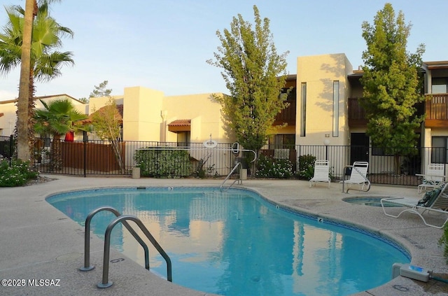 view of pool featuring a patio