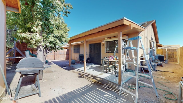 view of patio featuring grilling area and central air condition unit