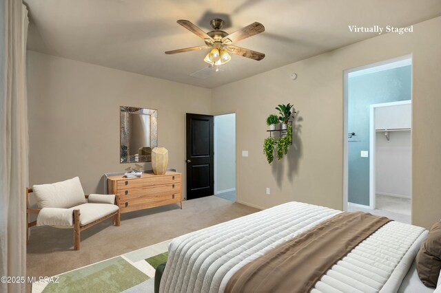 unfurnished bedroom featuring ceiling fan, light colored carpet, and a closet