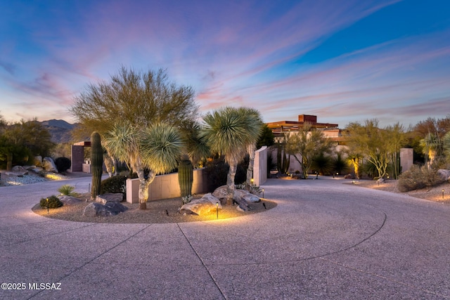 pueblo revival-style home with a mountain view