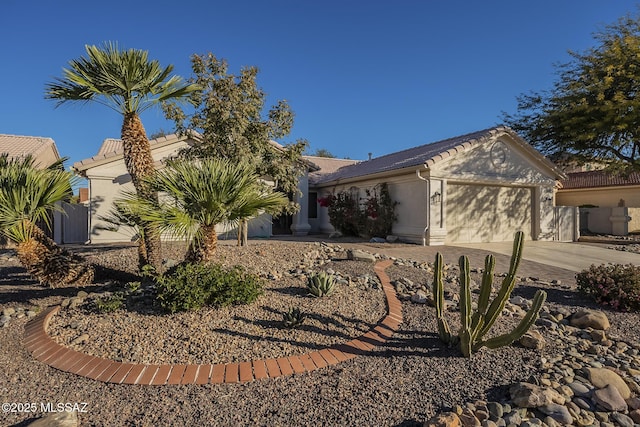 single story home featuring a garage