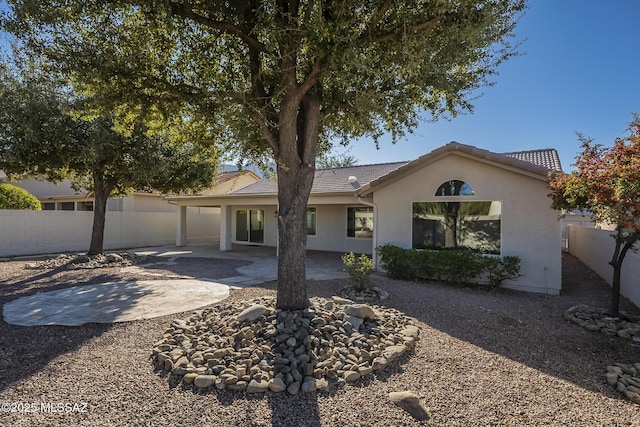 view of front of property featuring a patio