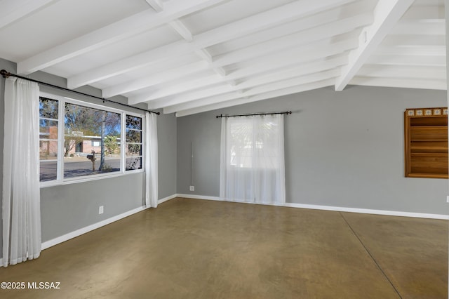 unfurnished room with vaulted ceiling with beams