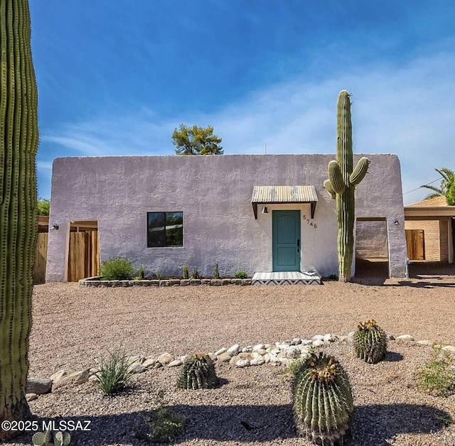 view of adobe home