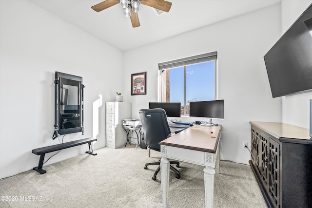 office featuring light carpet and ceiling fan