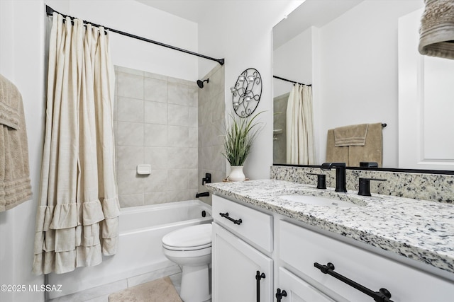 bathroom featuring tile patterned floors, vanity, toilet, and shower / bathtub combination with curtain