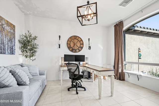 office space featuring tile patterned flooring, visible vents, and an inviting chandelier