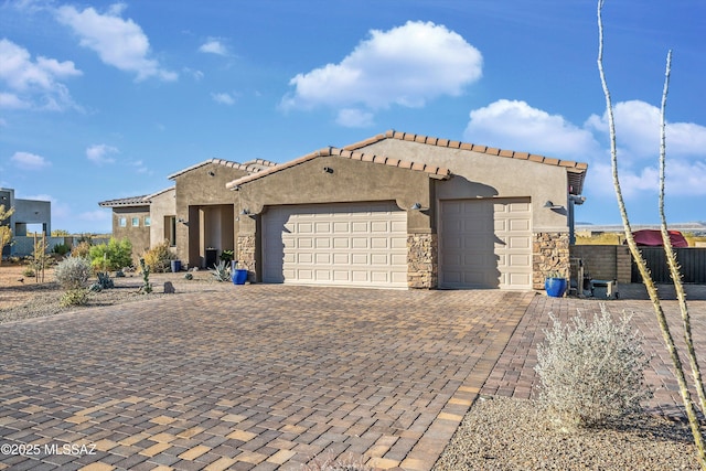 view of front of property with a garage