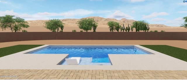 view of pool with a fenced backyard, a mountain view, and a fenced in pool