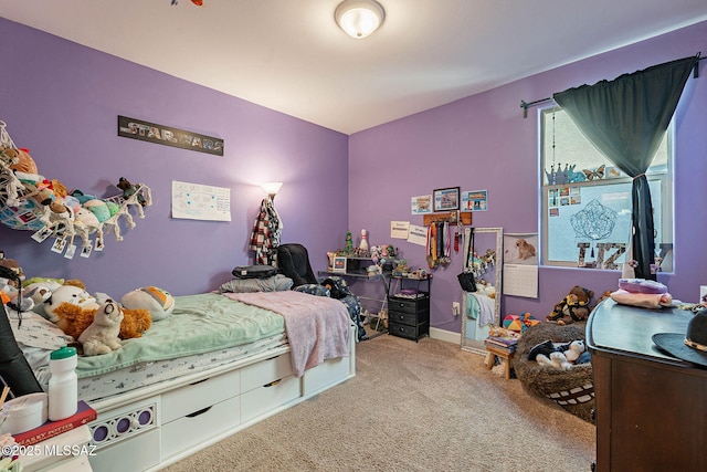 bedroom featuring carpet