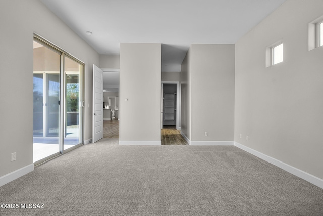 spare room featuring carpet flooring