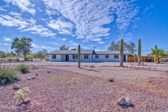 single story home featuring a patio